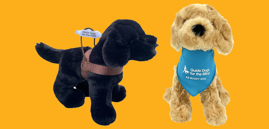 Two plush puppies on a bright gold background that links to the plush category