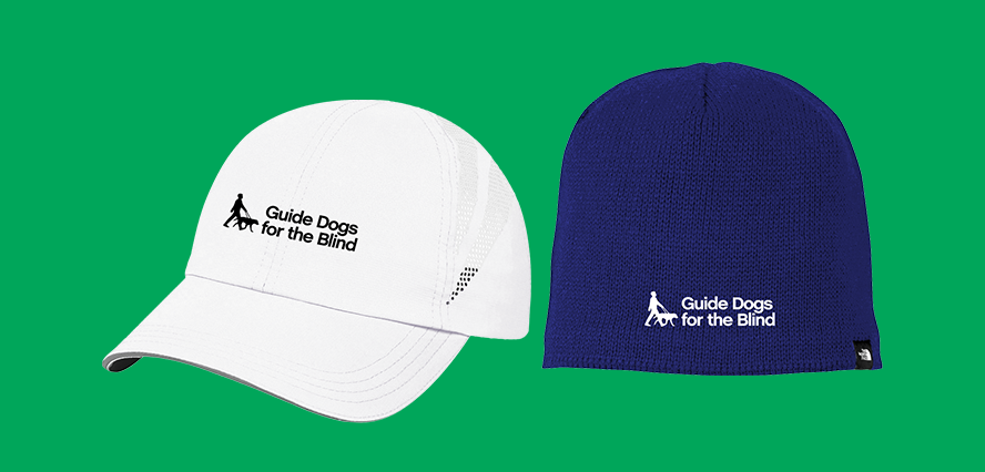 Two hats on a bright green background that links to the headwear category